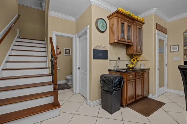 a kitchen with stainless steel appliances granite countertop a stove and a refrigerator