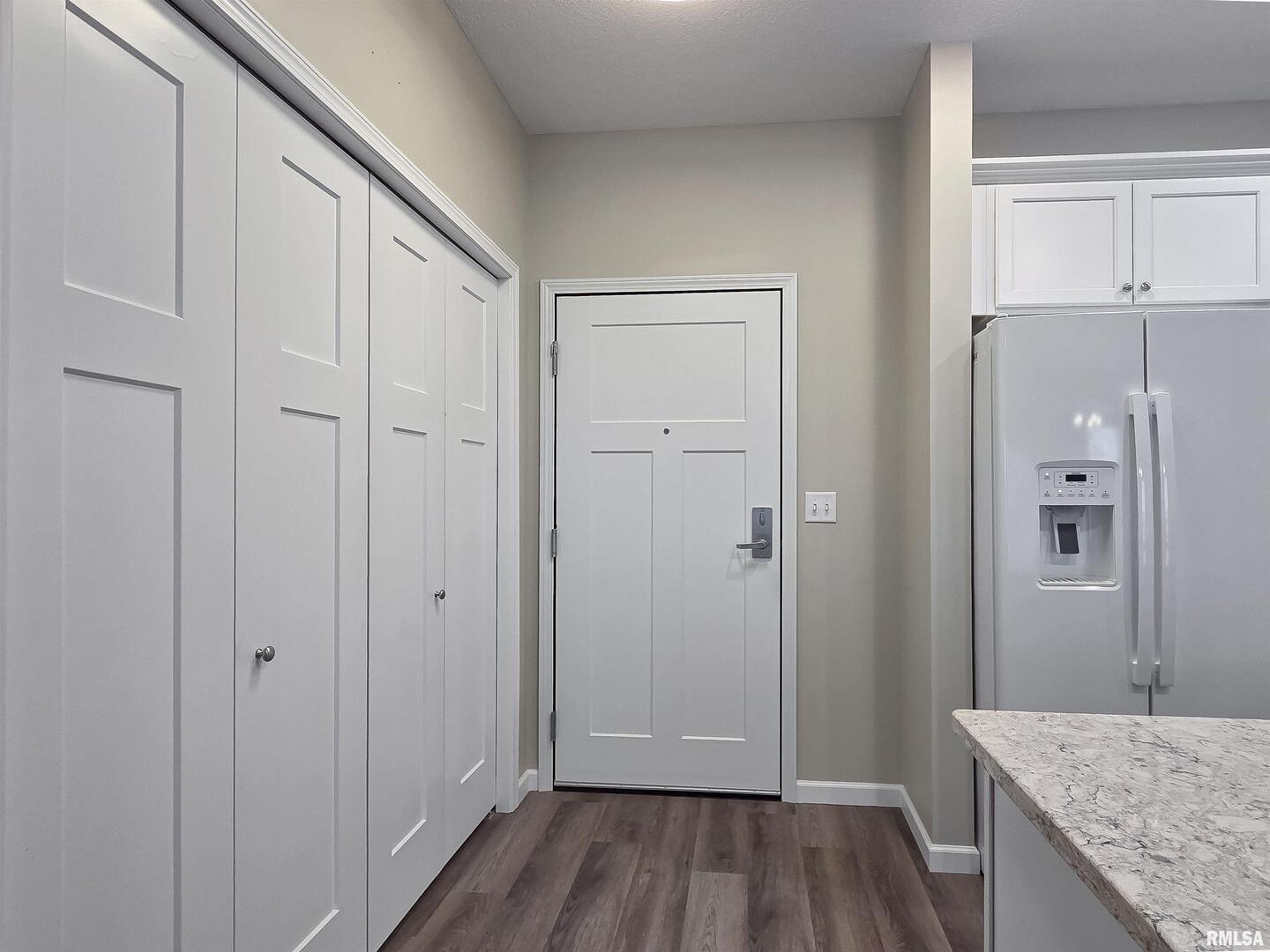2592 Middle Road, Unit 313 Bettendorf, IA 52722 - Photo 12 of 52 a view of hallway with wooden floor