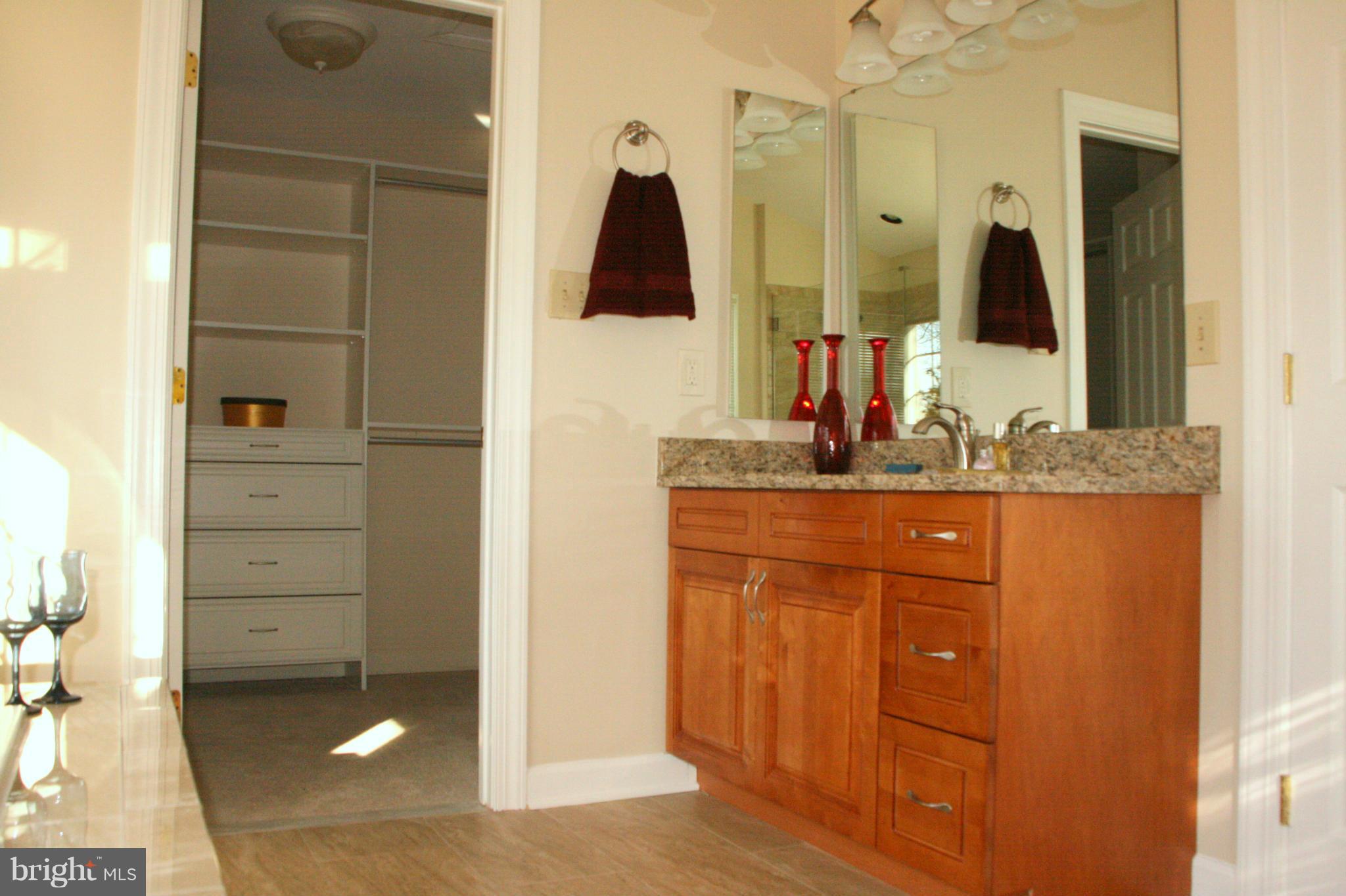19810 Falling Spring Court Gaithersburg, MD 20882 - Photo 21 of 30 Her Vanity & Walk in Closet w/Built-Ins