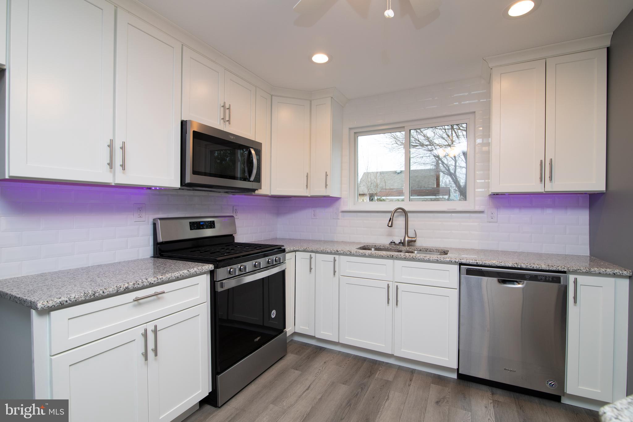 328 Peach Road Bellmawr, NJ 08031 - Photo 9 of 57 Under cabinet accent lighting in various colors...