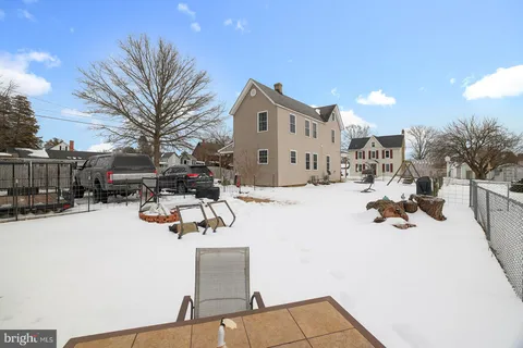 a car parked in front of a house