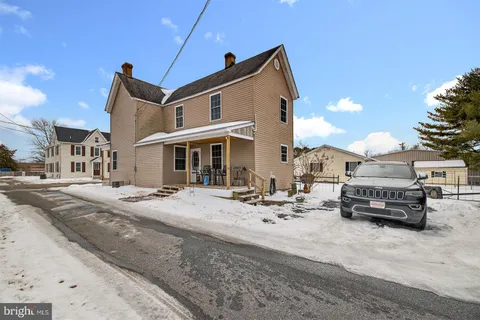 a view of a house with a patio