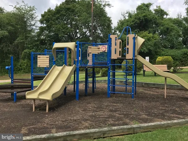 a view of a patio with swimming pool