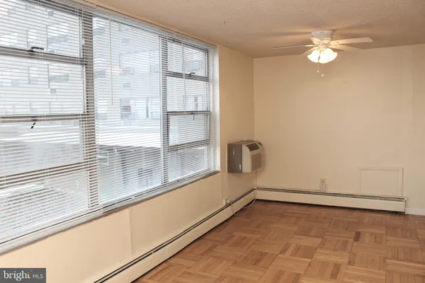 a view of an empty room and window