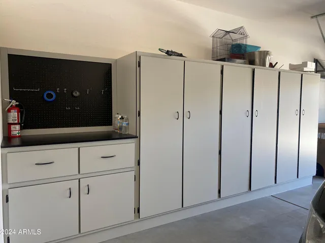a bathroom with a shower and a mirror