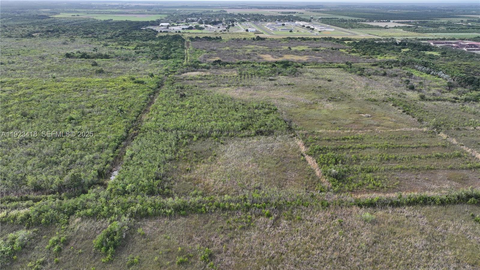 0 Southwest 382nd Street Homestead, FL 33034 - Photo 11 of 27 a view of a yard with an outdoor space