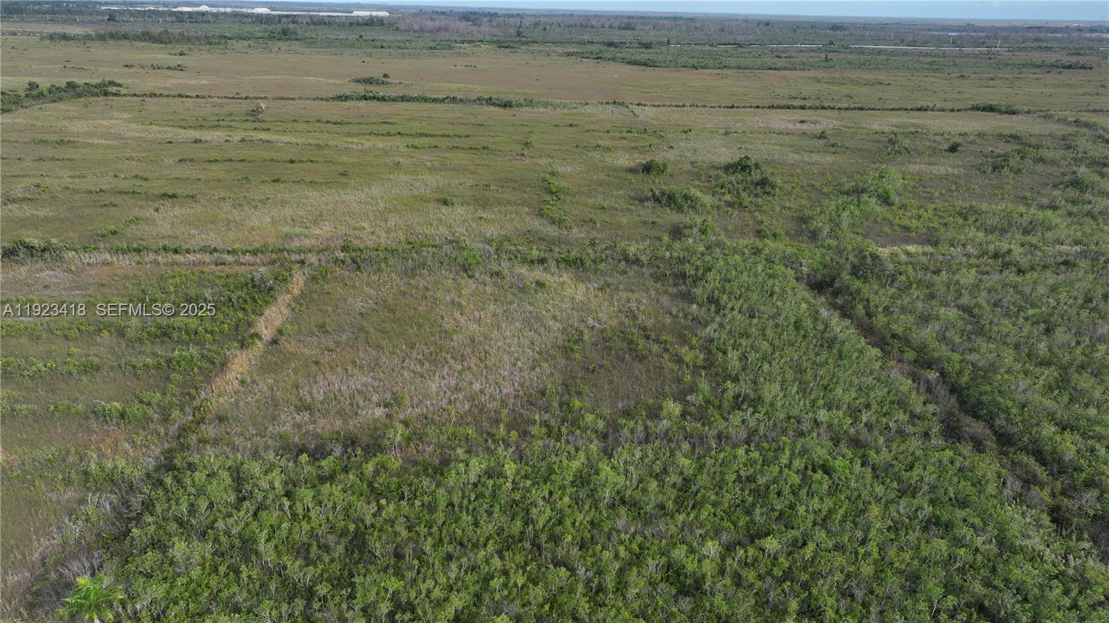 0 Southwest 382nd Street Homestead, FL 33034 - Photo 17 of 27 a view of beach and small yard