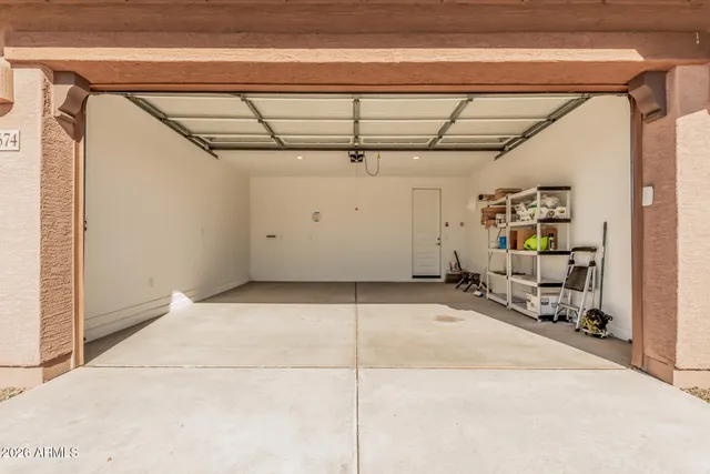 a view of a garage with wooden floor