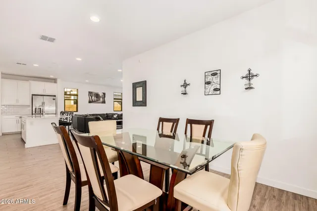 a view of a dining room with furniture