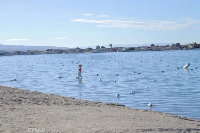 a view of ocean and mountain