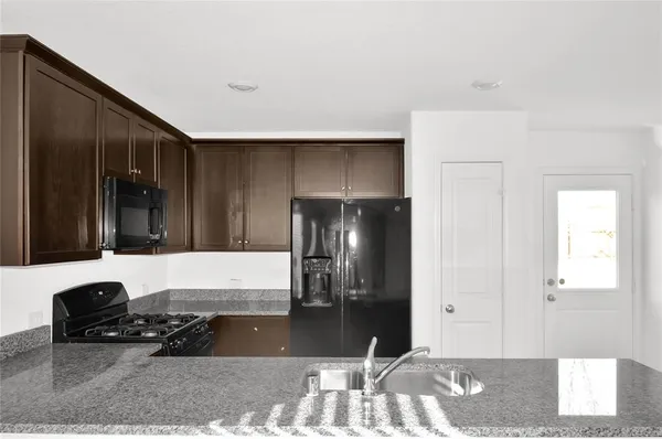 a living room with a couch and a rug