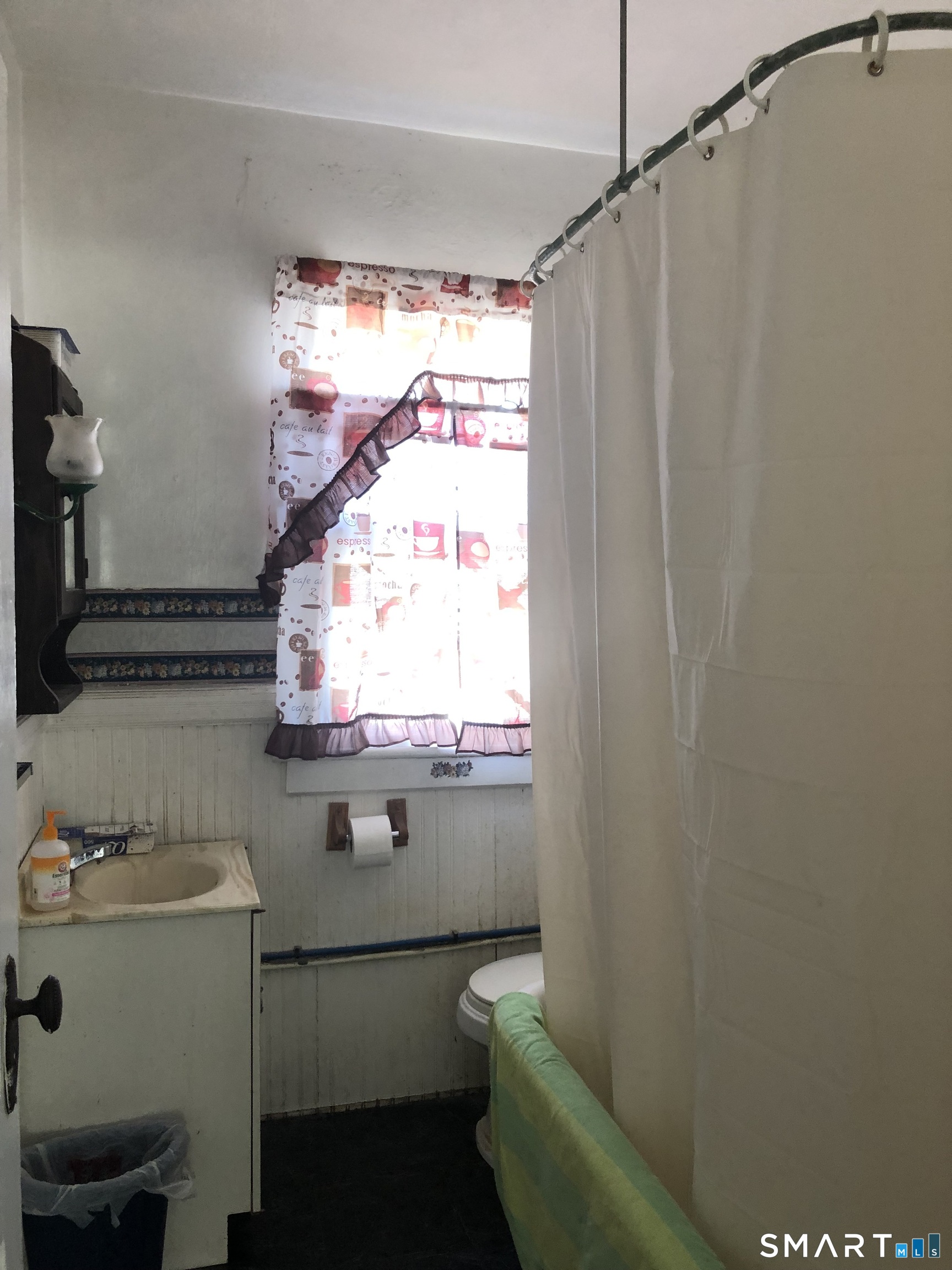 161 Spring Street Meriden, CT 06451 - Photo 20 of 22 a bathroom with a sink and a window