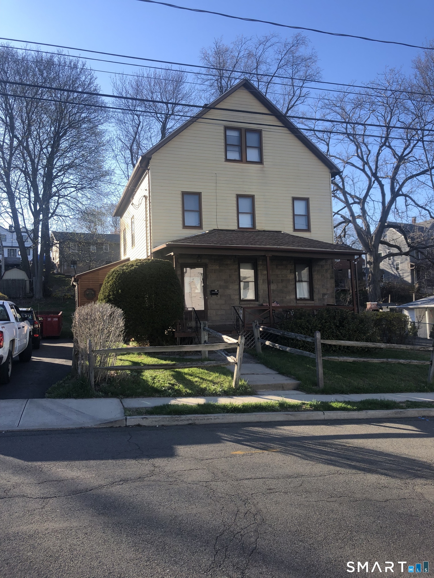 161 Spring Street Meriden, CT 06451 - Photo 2 of 22 a view of a house with a yard balcony and large tree