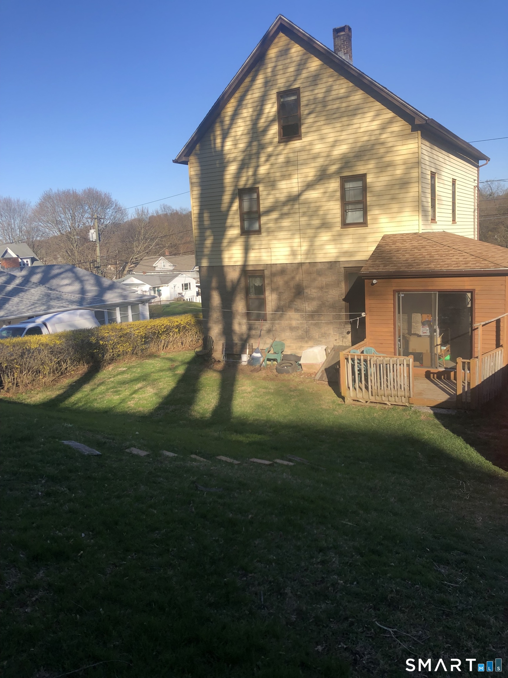 161 Spring Street Meriden, CT 06451 - Photo 4 of 22 a view of an apartment with a backyard