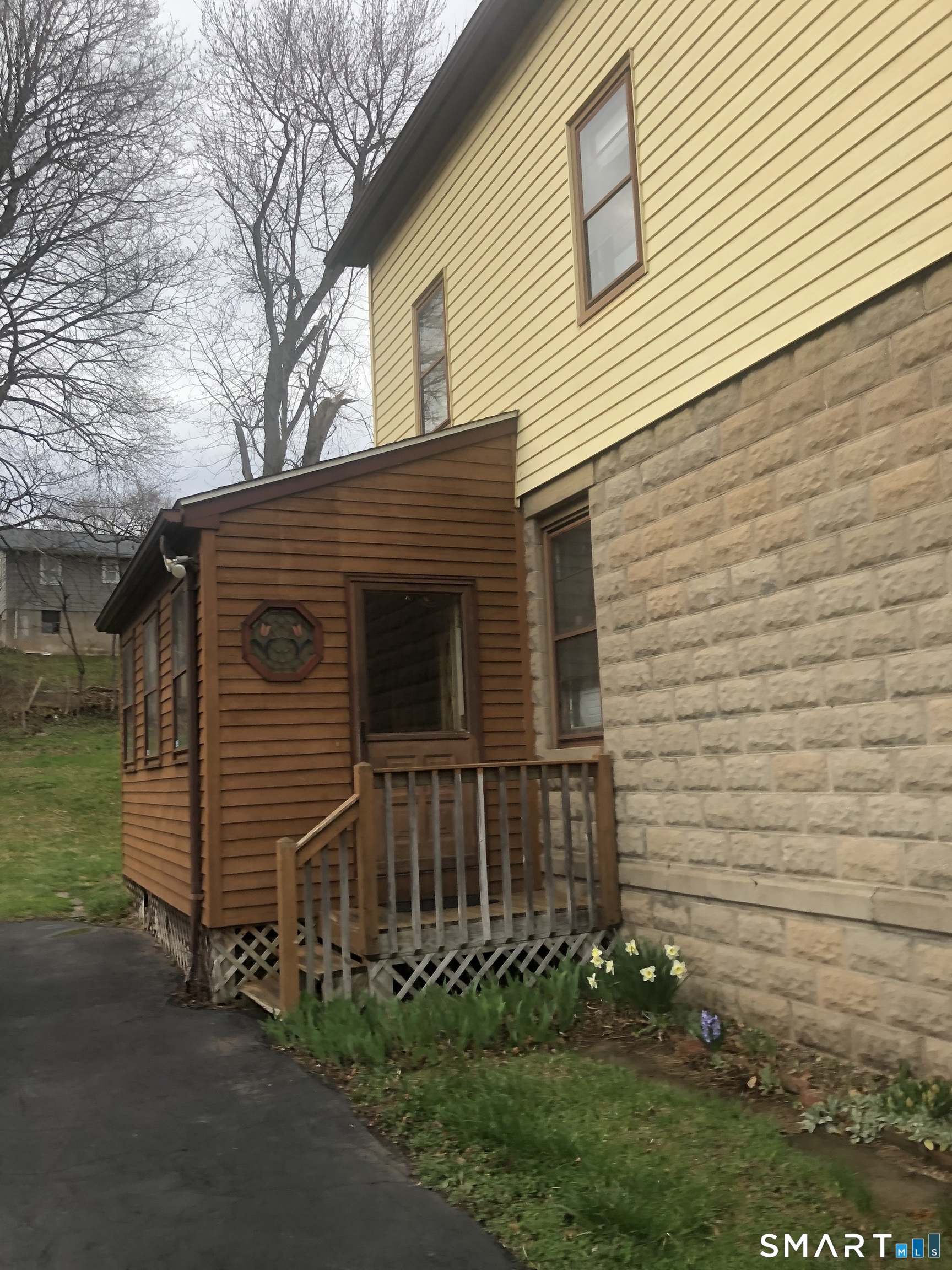 161 Spring Street Meriden, CT 06451 - Photo 6 of 22 a view of a house with a yard