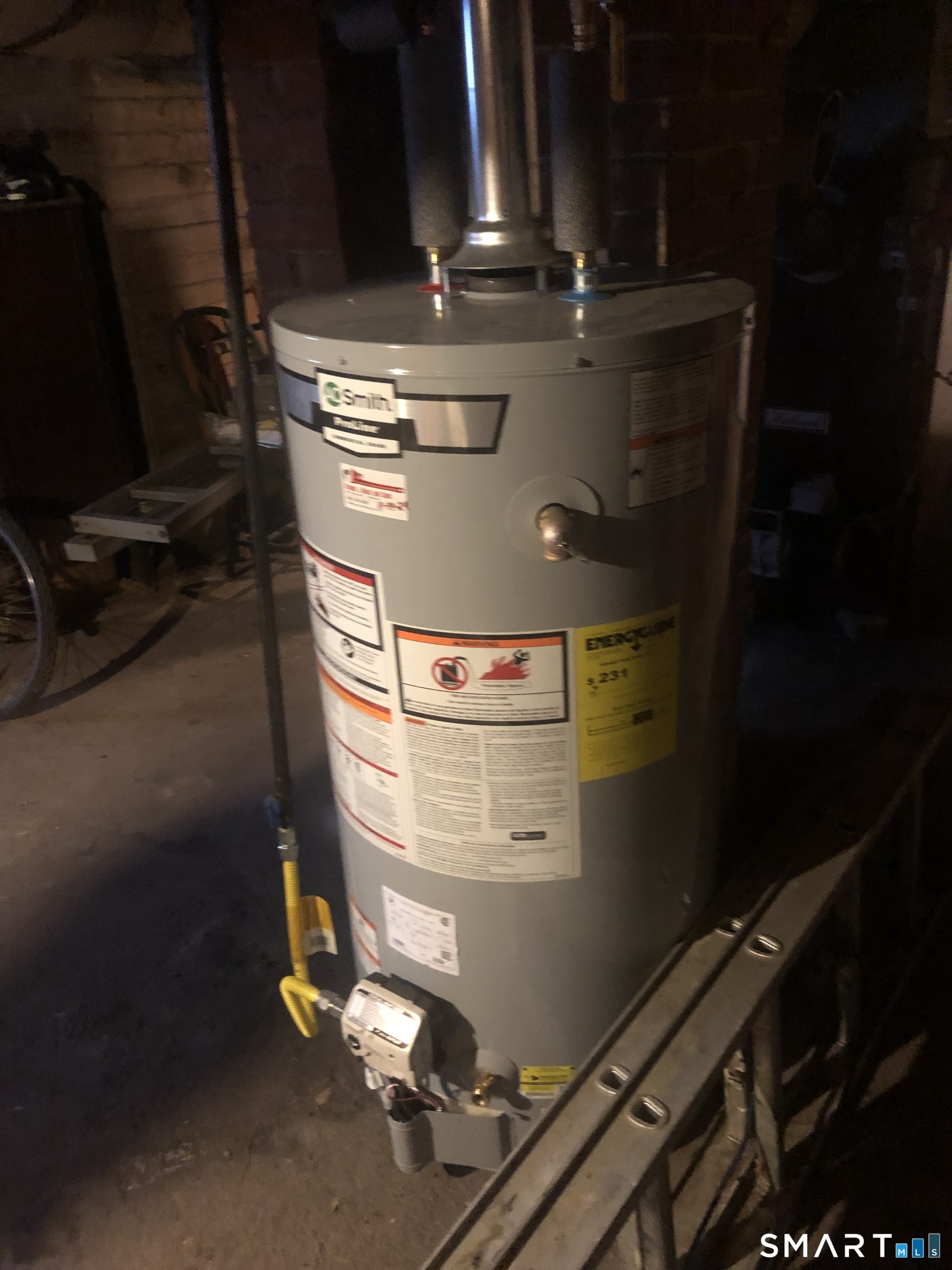 161 Spring Street Meriden, CT 06451 - Photo 10 of 22 a close view of water heater