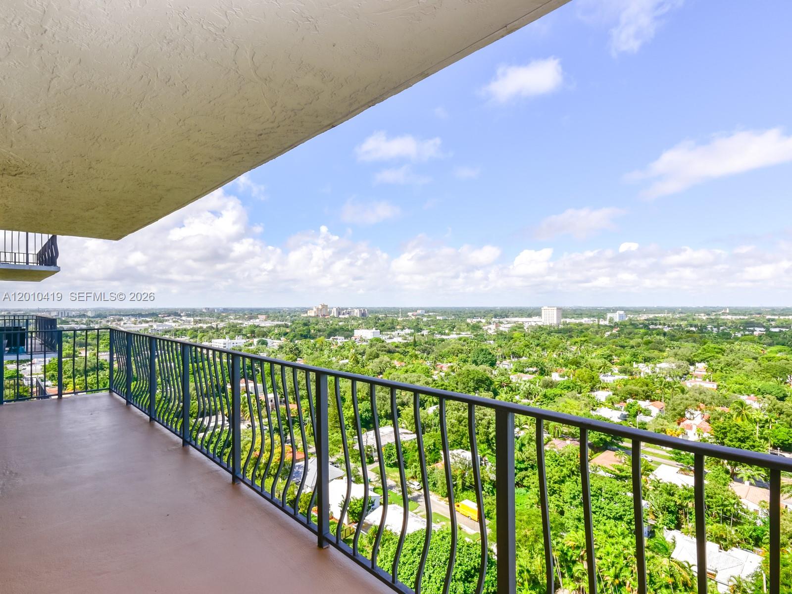 780 Northeast 69th Street, Unit 1908 Miami, FL 33138 - Photo 14 of 18 a view of a balcony with an ocean view