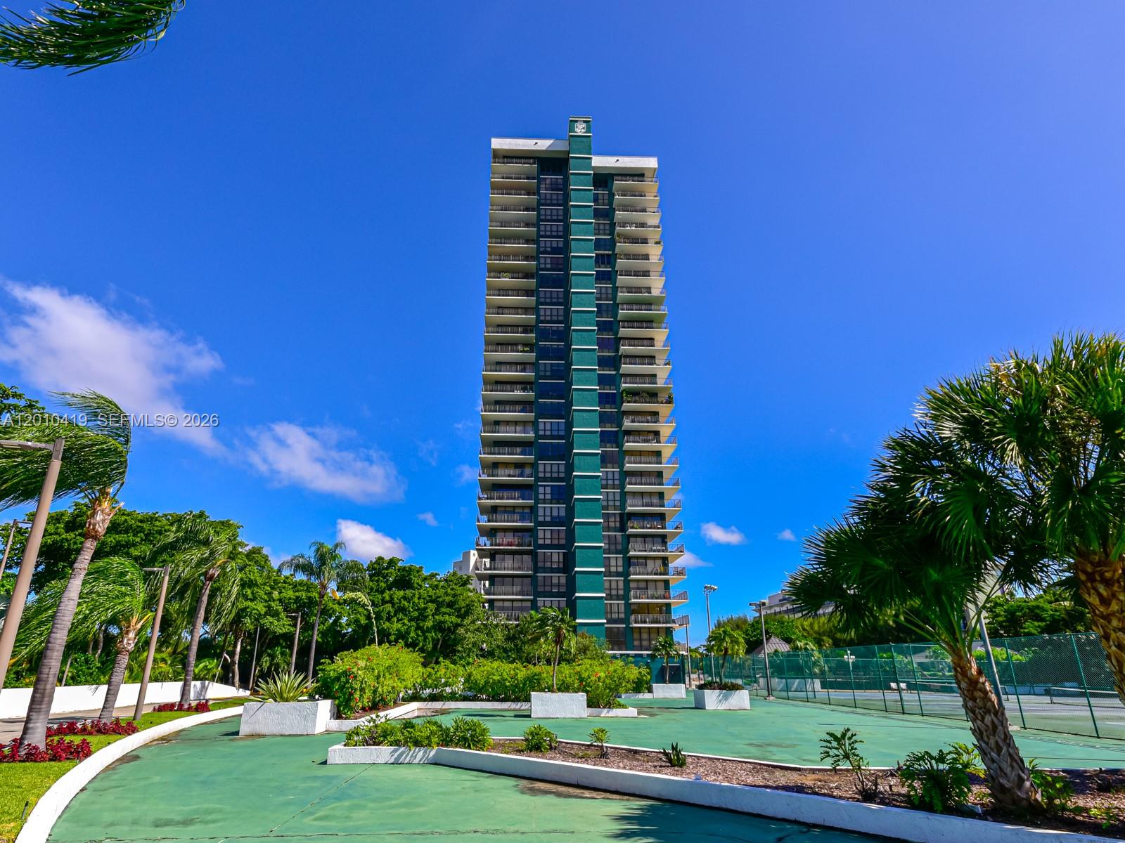 780 Northeast 69th Street, Unit 1908 Miami, FL 33138 - Photo 18 of 18 a front view of a multi story building