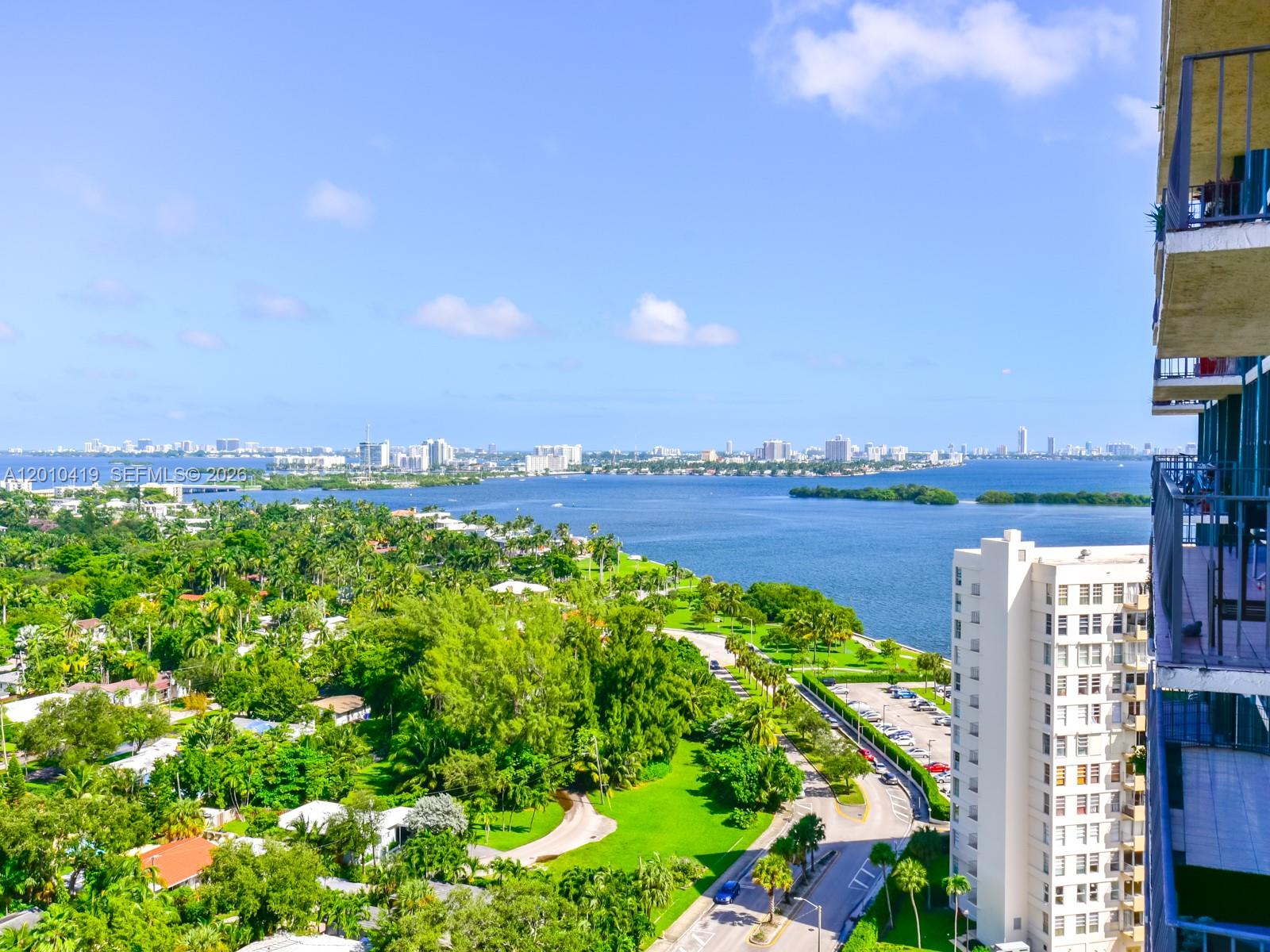 780 Northeast 69th Street, Unit 1908 Miami, FL 33138 - Photo 2 of 18 a view of a lake with a city