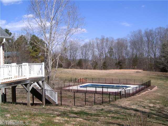 7871 Alcorn Road Oak Ridge, NC 27310 - Photo 3 of 3 Exterior Back.