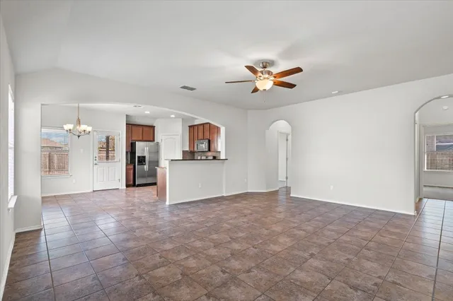 a view of livingroom with cabinet and window