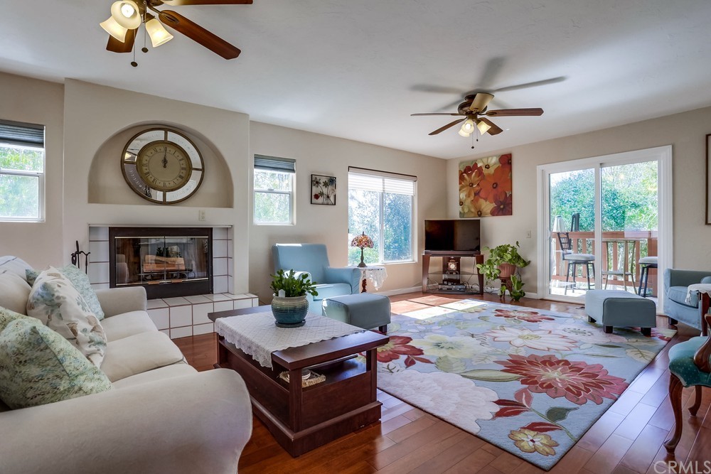 2725 Alta Vista Drive Fallbrook, CA 92028 - Photo 11 of 50 a living room with furniture and a fireplace