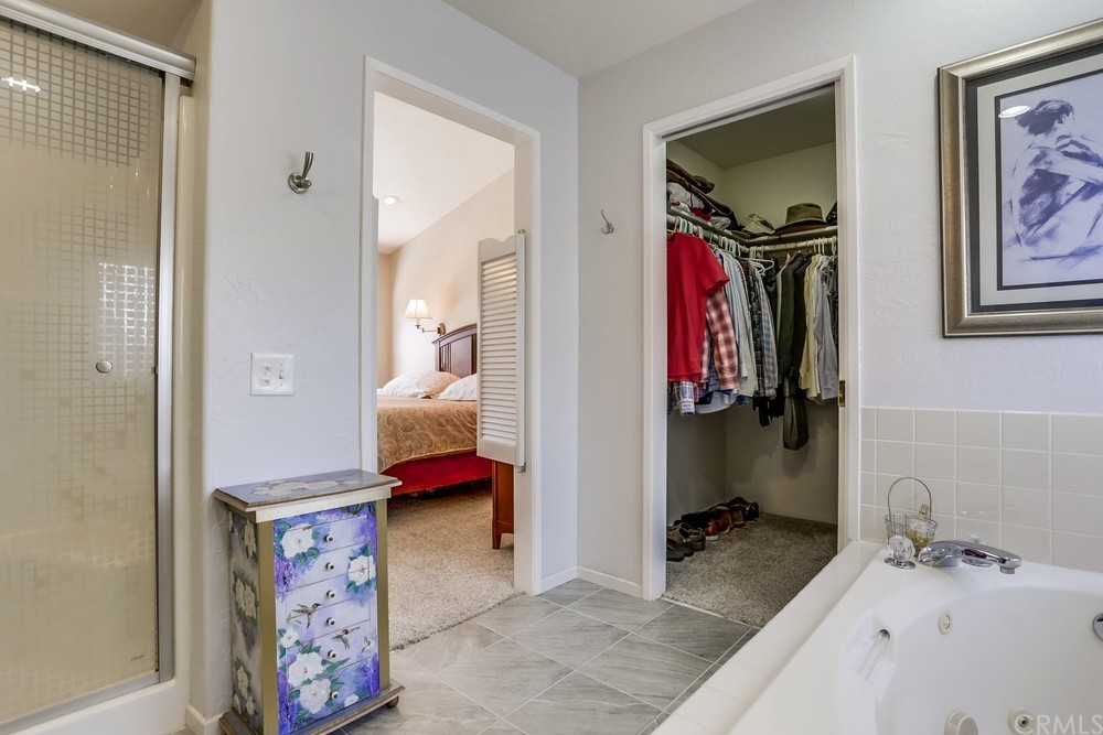 2725 Alta Vista Drive Fallbrook, CA 92028 - Photo 31 of 50 a bedroom with a bed and the view of bathroom