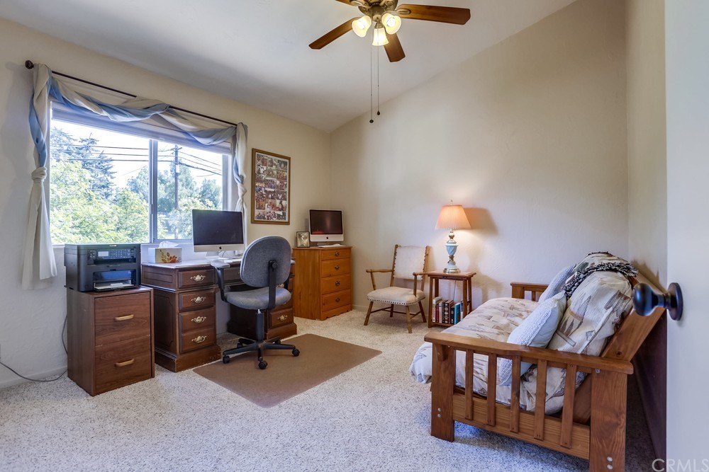 2725 Alta Vista Drive Fallbrook, CA 92028 - Photo 35 of 50 a view of a workspace with furniture and a window
