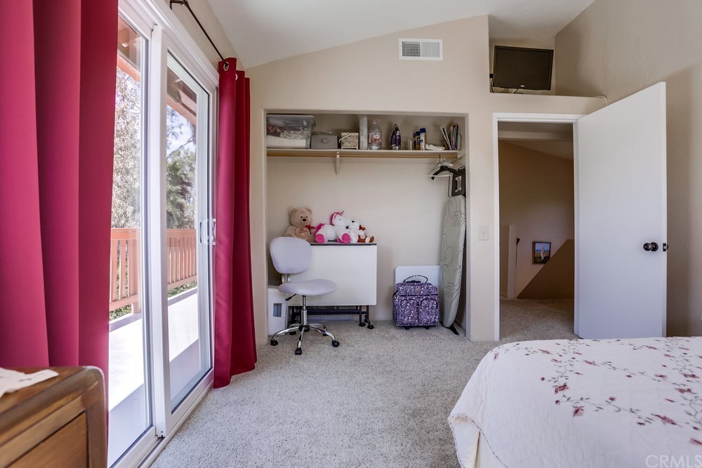 2725 Alta Vista Drive Fallbrook, CA 92028 - Photo 38 of 50 a bedroom with a bed and a dresser