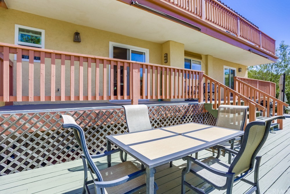 2725 Alta Vista Drive Fallbrook, CA 92028 - Photo 44 of 50 a balcony with table and chairs
