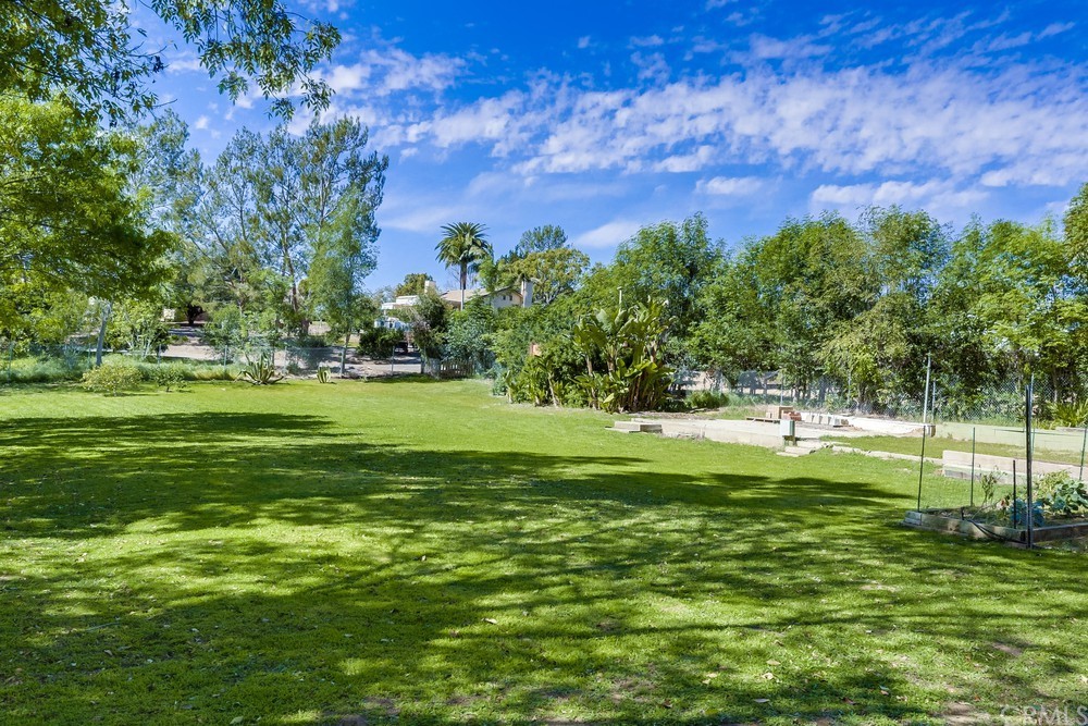 2725 Alta Vista Drive Fallbrook, CA 92028 - Photo 48 of 50 a garden view with a play ground