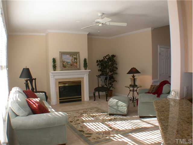 3524 La Costa Way Raleigh, NC 27610 - Photo 13 of 25 Warm and inviting! This bright, sunny Family Room is spacious and features a cozy fireplace.