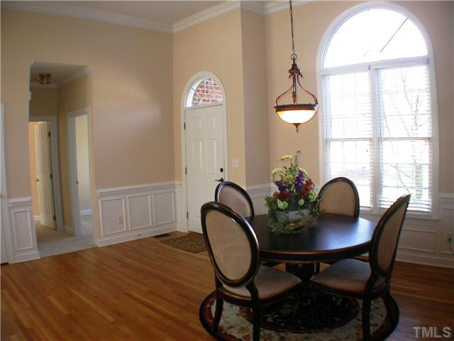 3524 La Costa Way Raleigh, NC 27610 - Photo 2 of 25 Gleaming hardwood floors and an abundance of natural light create a welcoming atmosphere.