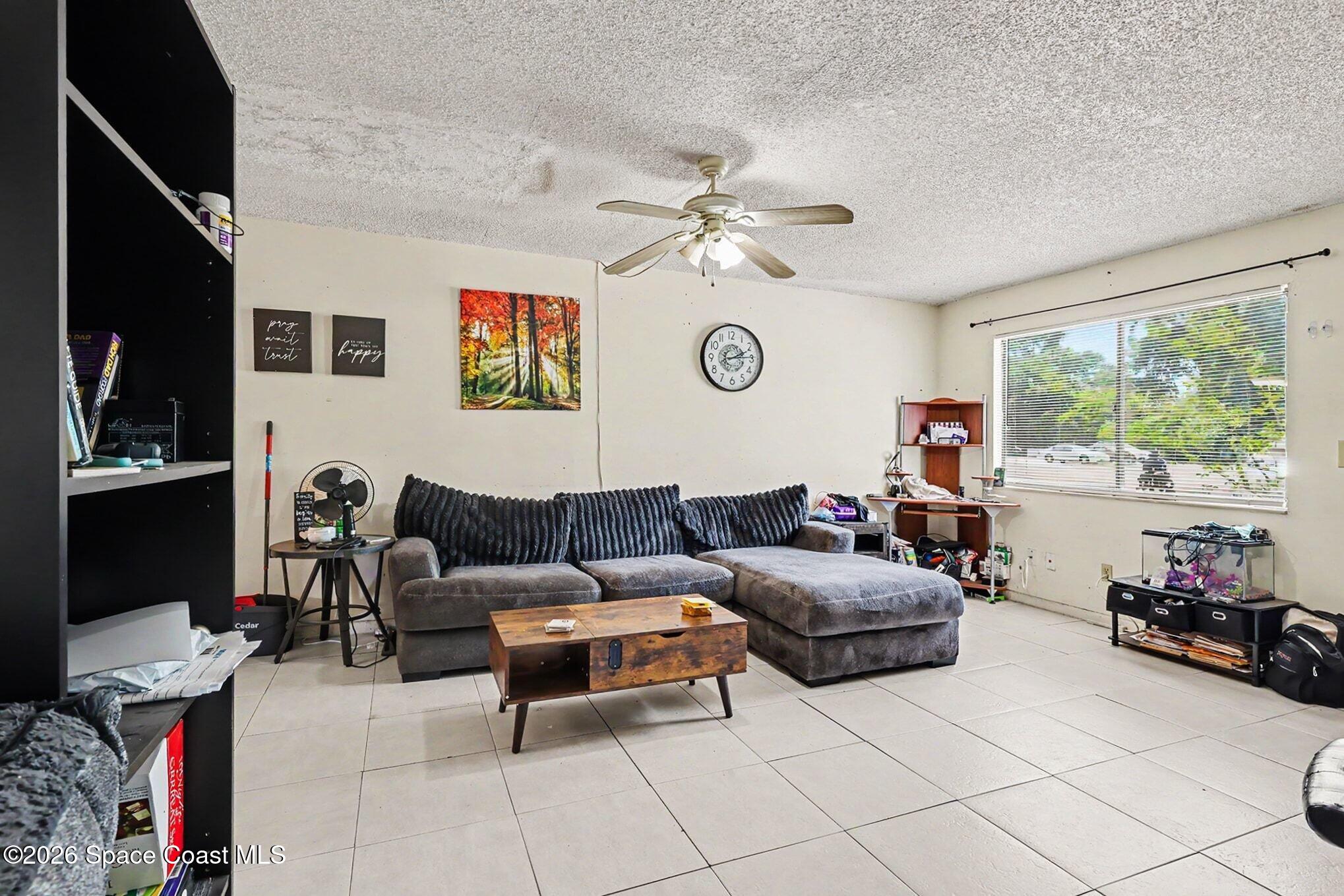 4017 Tree Ridge Lane Northeast Palm Bay, FL 32905 - Photo 10 of 25 007_file_5115