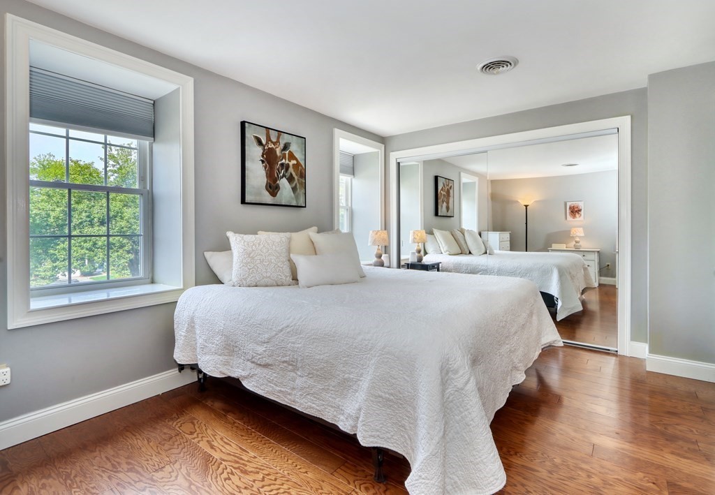 106 Shaw Farm Road, Unit 106 Canton, MA 02021 - Photo 16 of 27 a bedroom with a bed and window