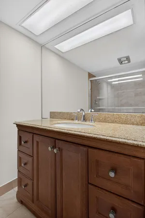 a bathroom with a shower and toilet