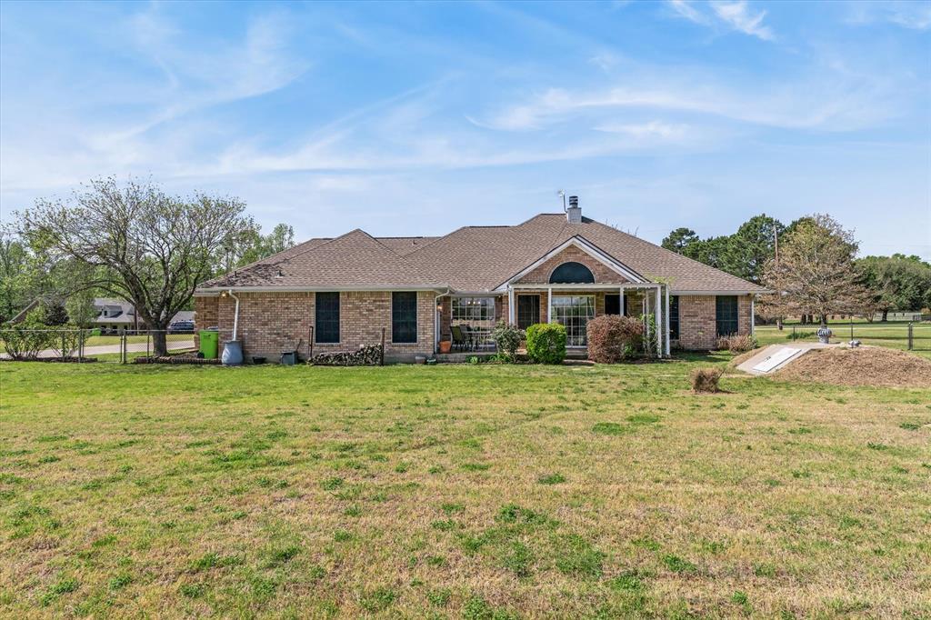 271 VZ County Road Canton, TX 75103 - Photo 38 of 40 a front view of a house with a yard