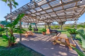 700 Island Retreat Road, Unit 37 Port Aransas, TX 78373 - Photo 31 of 34 a view of yard with patio