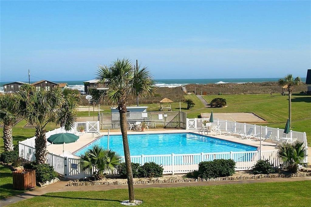700 Island Retreat Road, Unit 37 Port Aransas, TX 78373 - Photo 32 of 34 a view of a city with tall buildings