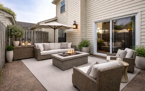 a outdoor living space with patio furniture and garden