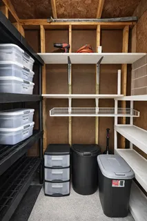 a room with wooden cabinets