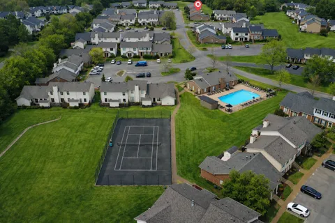 an aerial view of a house with a garden