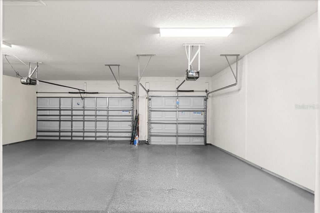 5851 Southwest 85th Place Ocala, FL 34476 - Photo 43 of 57 a view of a garage with racks