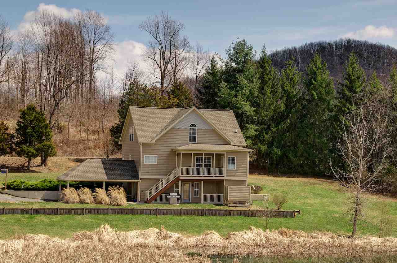 54 Jonestown Road Fairfield, VA 24435 - Photo 1 of 29 a front view of a house with garden