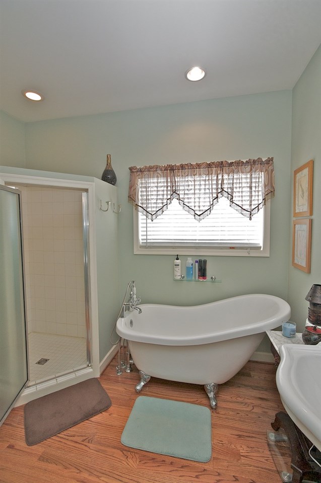 54 Jonestown Road Fairfield, VA 24435 - Photo 11 of 29 a bathroom with a tub sink and mirror