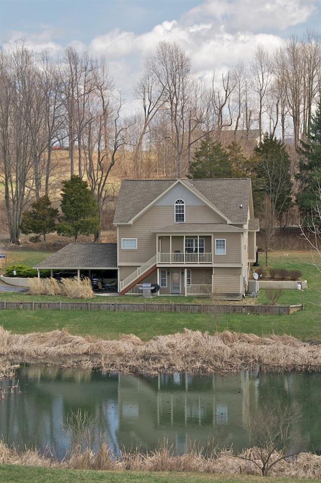 54 Jonestown Road Fairfield, VA 24435 - Photo 27 of 29 a view of a big house with a big yard and large trees