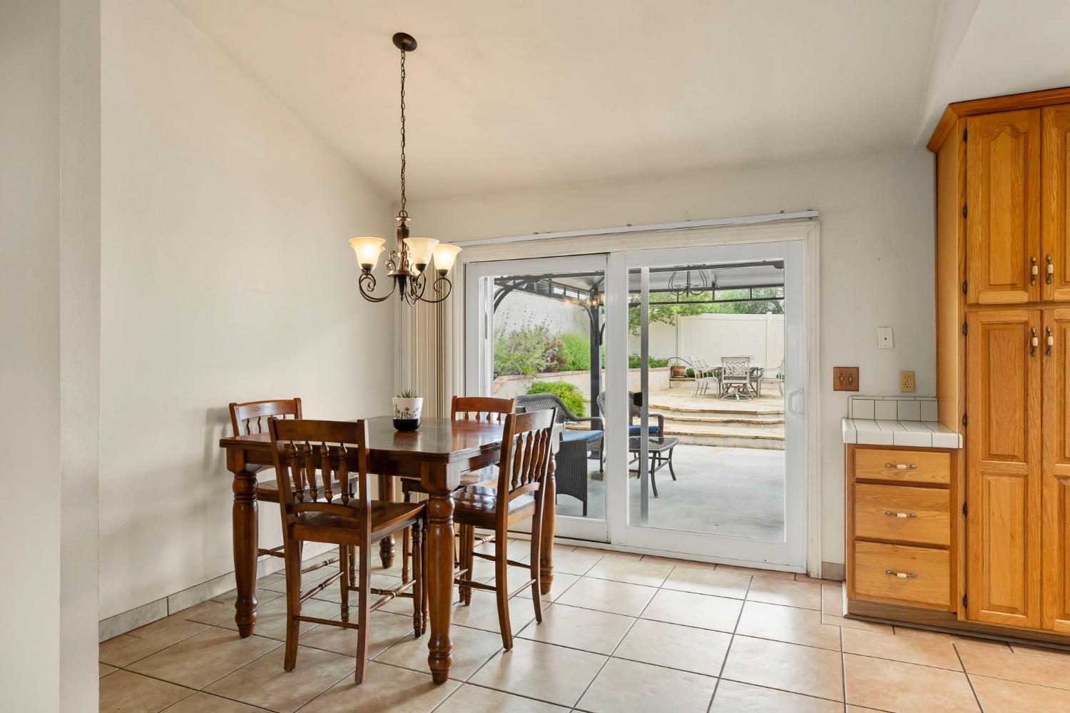 150 North Donna Street Oak View, CA 93022 - Photo 14 of 47 a view of a dining room with furniture window and outside view