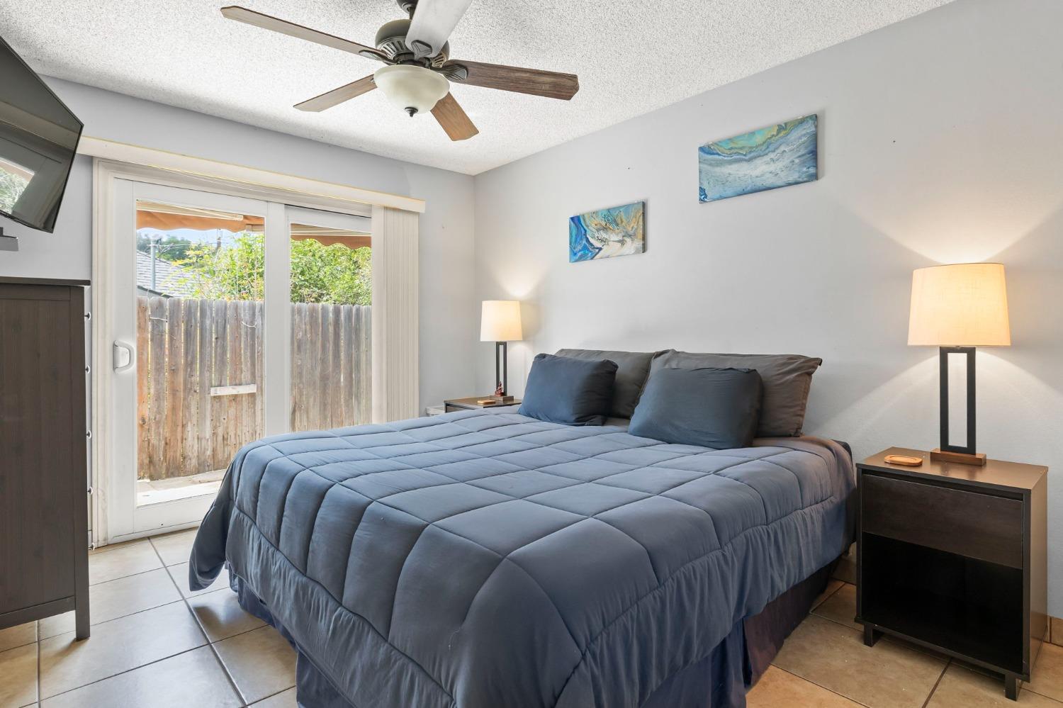 150 North Donna Street Oak View, CA 93022 - Photo 27 of 47 a bedroom with a bed and a lamp