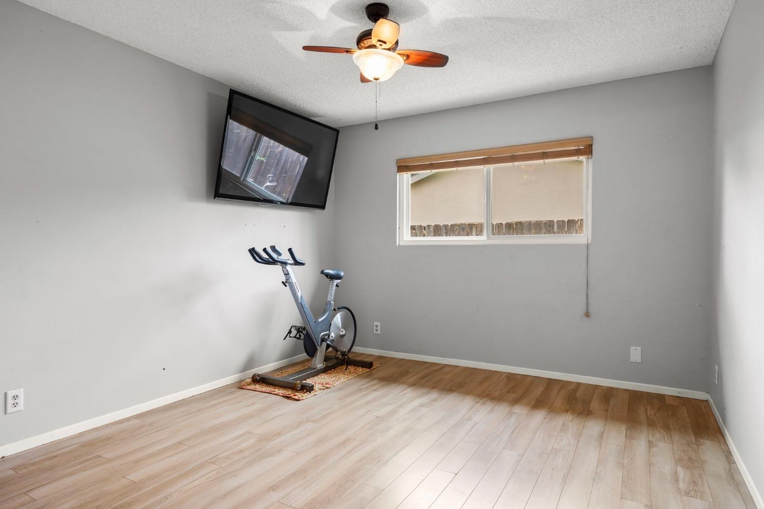 150 North Donna Street Oak View, CA 93022 - Photo 28 of 47 a view of room with wooden floor and ceiling fan