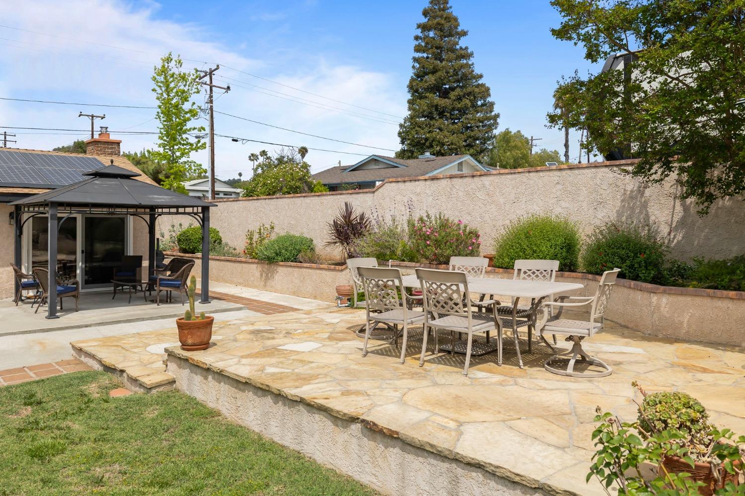150 North Donna Street Oak View, CA 93022 - Photo 34 of 47 a view of a patio with a table and chairs